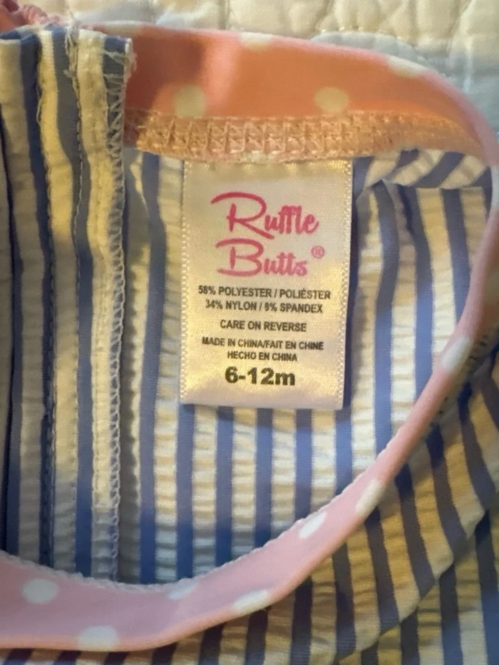 Ruffle Butts Blue and White Striped Long-Sleeve One-Piece with Pink Trim
